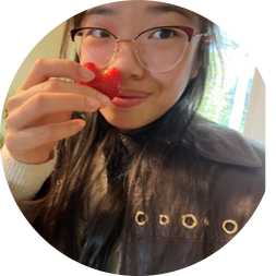 Maria Wen with a heart-shaped strawberry