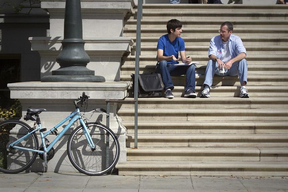 Professor David Menifee-Libey and a student on the Carnegie Hall steps