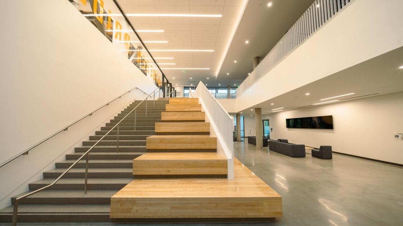 Stairway seating area leading to upstairs of Center for Athletics, Recreation and Wellness